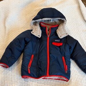 Patagonia Dark Blue Jacket with Red Trim